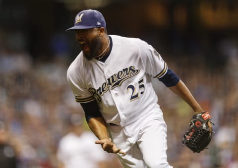 Former Milwaukee Brewers pitcher Jay Jackson (25) celebrates after getting the final out of the seventh inning against the San Diego Padres. He is reportedly close to signing with the SF Giants. (Jeff Hanisch-USA TODAY Sports)