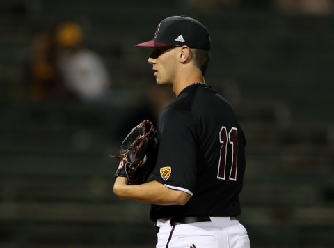 SF Giants prospect RJ Dabovich (11) looks for a sign while pitching against Villanova at Phoenix Municipal Stadium during his time at Arizona State.