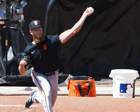 SF Giants pitcher Conner Menez (51) pitches the ball during a workout at Oracle Park. (L Cox-USA TODAY Sports)