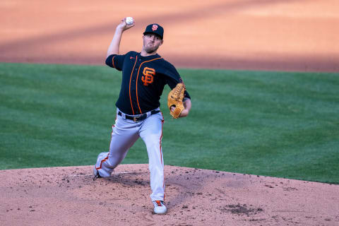 SF Giants starting pitcher Kevin Gausman (34) delivers a pitch during the first inning against the Oakland Athletics. (Neville E. Guard-USA TODAY Sports)