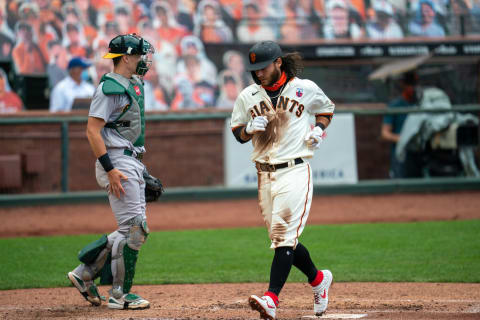 SF Giants shortstop Brandon Crawford (35) scores on a RBI single from right fielder Mike Yastrzemski (not pictured) during the third inning against the Oakland Athletics at Oracle Park. (Neville E. Guard-USA TODAY Sports)