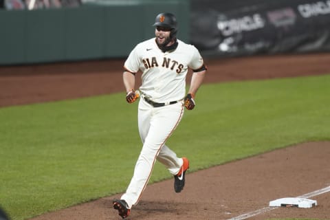 SF Giants first baseman Darin Ruf (33) celebrates after hitting a solo home run against the Seattle Mariners during the seventh inning at Oracle Park. (Kyle Terada-USA TODAY Sports)