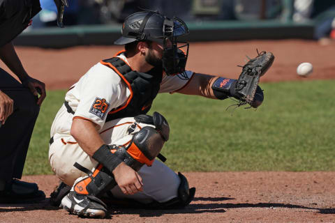 SF Giants catcher Joey Bart (21) catches a pitch during the fifth inning against the Seattle Mariners at Oracle Park. (Darren Yamashita-USA TODAY Sports)