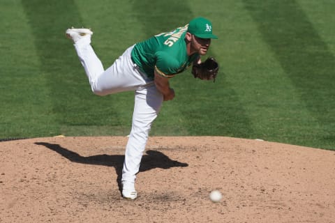 Oakland Athletics relief pitcher Liam Hendriks (16) throws a pitch during the seventh inning against the Seattle Mariners at Oakland Coliseum. (Darren Yamashita-USA TODAY Sports)