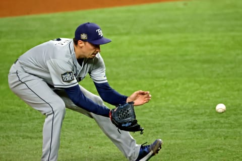 Tampa Bay Rays starting pitcher Blake Snell (4) fields a ground during the fifth inning against the Los Angeles Dodgers during game six of the 2020 World Series at Globe Life Field. (Kevin Jairaj-USA TODAY Sports)