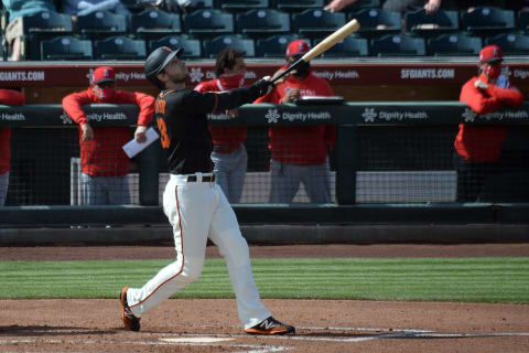 SF Giants right fielder Austin Slater (13) bats against the Los Angeles Angels during the third inning at Scottsdale Stadium. (Joe Camporeale-USA TODAY Sports)