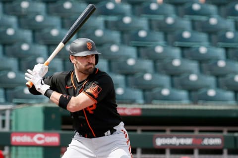 Former Reds catcher Curt Casali enters the batters box in the first inning of the MLB Cactus League Spring Training game between the Cincinnati Reds and the SF Giants at Goodyear Ballpark in Goodyear, Ariz., on Sunday, March 7, 2021.