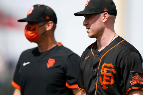 SF Giants starting pitcher Anthony DeSclafani (26) walks on the field for the first inning of the MLB Cactus League Spring Training game between the Cincinnati Reds and the San Francisco Giants at Goodyear Ballpark in Goodyear, Ariz., on Sunday, March 7, 2021.