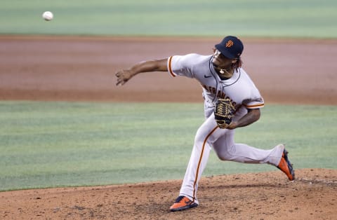 SF Giants pitcher Camilo Doval (75) throws against the Miami Marlins during the seventh inning at loanDepot Park. (Rhona Wise-USA TODAY Sports)