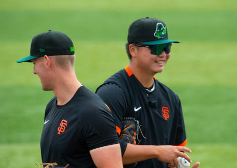 Pitchers Nick Morreale, left, and Kei-Wei Teng visit PK Park for the start of the Eugene Emeralds’ 2021 season.SF Giants prospects