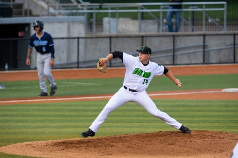 SF Giants pitching prospect Seth Corry with the Eugene Emeralds throws against Hillsboro with a player in third during the second inning at PK Park in Eugene.