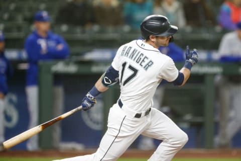 Seattle Mariners right fielder Mitch Haniger (17) singles against the Texas Rangers during the seventh inning at T-Mobile Park. Could the SF Giants make a move for the Mountain View, California native? (Joe Nicholson-USA TODAY Sports)