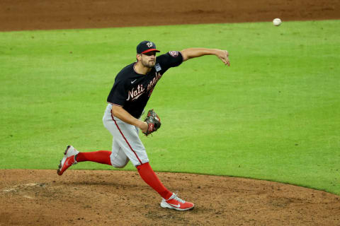 Washington Nationals relief pitcher Brad Hand (52) pitches against the Atlanta Braves during the ninth inning at Truist Park. (Jason Getz-USA TODAY Sports)