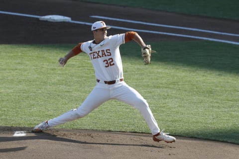 Jun 20, 2021; Omaha, Nebraska, USA; Texas Longhorns pitcher Ty Madden (32) throws against the Mississippi State Bulldogs at TD Ameritrade Park. (Bruce Thorson-USA TODAY Sports)