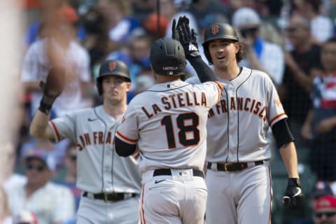 Sep 11, 2021; Chicago, Illinois, USA; SF Giants second baseman Tommy La Stella (18) celebrates his three-run home run during the fifth inning against the Chicago Cubs at Wrigley Field. (Patrick Gorski-USA TODAY Sports)