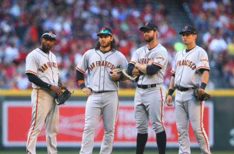 Apr 2, 2017; Phoenix, AZ, USA; San Francisco Giants (from left) third baseman Eduardo Nunez , shortstop Brandon Crawford , first baseman Brandon Belt and second baseman Joe Panik against the Arizona Diamondbacks during opening day at Chase Field. Mandatory Credit: Mark J. Rebilas-USA TODAY Sports