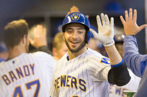 Apr 28, 2017; Milwaukee, WI, USA; Milwaukee Brewers left fielder Ryan Braun (8) high fives teammates after hitting a home run during the fifth inning against the Atlanta Braves at Miller Park. Mandatory Credit: Jeff Hanisch-USA TODAY Sports