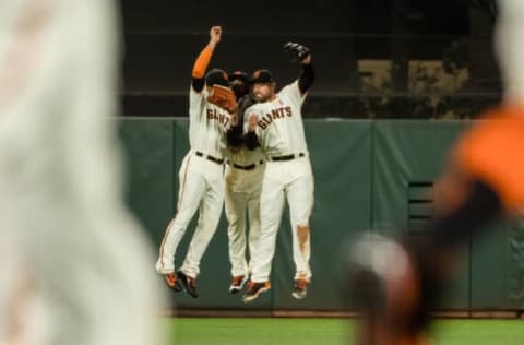 May 15, 2017; San Francisco, CA, USA; San Francisco Giants outfielders celebrate after the win against the Los Angeles Dodgers at AT&T Park. The Giants defeated the Dodgers 8-4. Mandatory Credit: Kelley L Cox-USA TODAY Sports