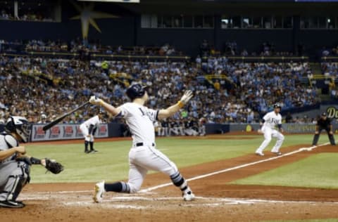 May 20, 2017; St. Petersburg, FL, USA; Tampa Bay Rays designated hitter Corey Dickerson (10) hits a 3-run home run during the fourth inning against the New York Yankees at Tropicana Field. Mandatory Credit: Kim Klement-USA TODAY Sports