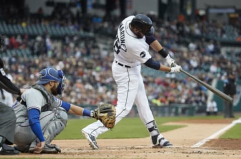 May 20, 2017; Detroit, MI, USA; Detroit Tigers right fielder J.D. Martinez (28) hits a home run in the first inning against the Texas Rangers at Comerica Park. Mandatory Credit: Rick Osentoski-USA TODAY Sports