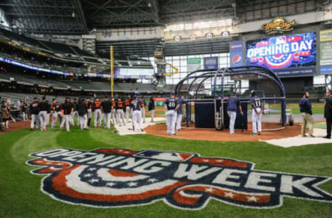 Apr 4, 2016; Milwaukee, WI, USA; Players warm up before the Opening Day game between the Milwaukee Brewers and the San Francisco Giants at Miller Park. Mandatory Credit: Benny Sieu-USA TODAY Sports