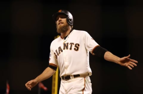 Oct 11, 2016; San Francisco, CA, USA; San Francisco Giants right fielder Hunter Pence (8) celebrates after scoring during the fifth inning of game four of the 2016 NLDS playoff baseball game against the Chicago Cubs at AT&T Park. Mandatory Credit: John Hefti-USA TODAY Sports