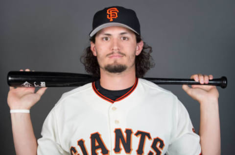 February 28, 2016; Scottsdale, AZ, USA; San Francisco Giants right fielder Jarrett Parker (6) poses for a picture during photo day at Scottsdale Stadium. Mandatory Credit: Kyle Terada-USA TODAY Sports