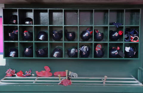 Cleveland Indians helmets and bats (Photo by Victor Decolongon/Getty Images)