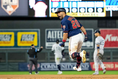 MINNEAPOLIS, MN – OCTOBER 07: Eddie Rosario #20 of the Minnesota Twins celebrates after hitting a home run against the New York Yankees on October 7, 2019 in game three of the American League Division Series at the Target Field in Minneapolis, Minnesota. (Photo by Brace Hemmelgarn/Minnesota Twins/Getty Images)