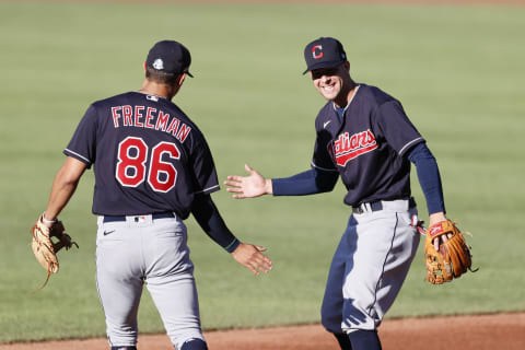 CLEVELAND, OH – JULY 13: Tyler Freeman #86 and Ernie Clement #83 of the Cleveland Indians celebrate in the first inning of an intrasquad game during summer workouts at Progressive Field on July 13, 2020 in Cleveland, Ohio. (Photo by Ron Schwane/Getty Images)