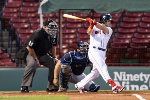 BOSTON, MA – AUGUST 11: Andrew Benintendi #16 of the Boston Red Sox hits a single during the first inning of a game against the Tampa Bay Rays on August 11, 2020 at Fenway Park in Boston, Massachusetts. (Photo by Billie Weiss/Boston Red Sox/Getty Images)