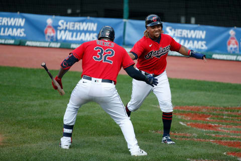 Franmil Reyes #32 of the Cleveland Indians congratulates Jose Ramirez #11 (Photo by Kirk Irwin/Getty Images)