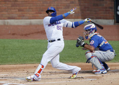 Potential Cleveland Indians free agent addition Yoenis Cespedes #52 (Photo by Jim McIsaac/Getty Images)