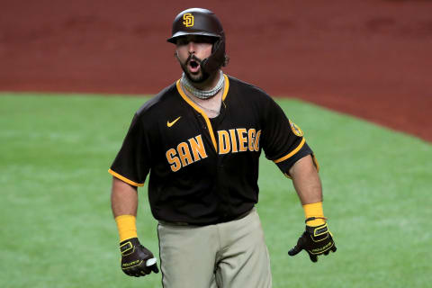 ARLINGTON, TEXAS – AUGUST 17: Austin Hedges #18 of the San Diego Padres celebrates after hitting a solo home run against the Texas Rangers in the top of the fourth inning at Globe Life Field on August 17, 2020 in Arlington, Texas. (Photo by Tom Pennington/Getty Images)