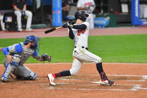 CLEVELAND, OHIO – SEPTEMBER 07: Tyler Naquin #30 of the Cleveland Indians hits an RBI sacrifice fly scoring Francisco Lindor #12 during the fourth inning against the Kansas City Royals Progressive Field on September 07, 2020 in Cleveland, Ohio. (Photo by Jason Miller/Getty Images)