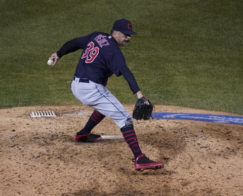 CHICAGO, ILLINOIS – SEPTEMBER 16: Oliver Perez #39 of the Cleveland Indians throws a pitch during the eighth inning against the Chicago Cubs at Wrigley Field on September 16, 2020 in Chicago, Illinois. (Photo by Nuccio DiNuzzo/Getty Images)