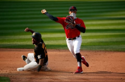 CLEVELAND, OH – SEPTEMBER 27: Francisco Lindor #12 of the Cleveland Indians forces out Ke’Bryan Hayes #13 of the Pittsburgh Pirates at second base during the game at Progressive Field on September 27, 2020 in Cleveland, Ohio. (Photo by Kirk Irwin/Getty Images)