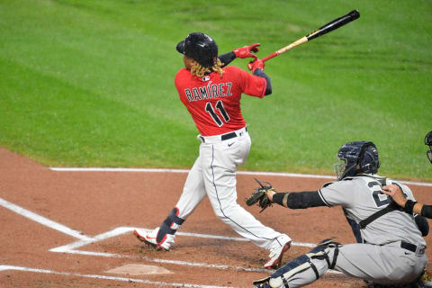 CLEVELAND, OHIO – SEPTEMBER 30: Jose Ramirez #11 of the Cleveland Indians hits an RBI double during the first inning of Game Two of the American League Wild Card Series against the New York Yankees at Progressive Field on September 30, 2020 in Cleveland, Ohio. (Photo by Jason Miller/Getty Images)