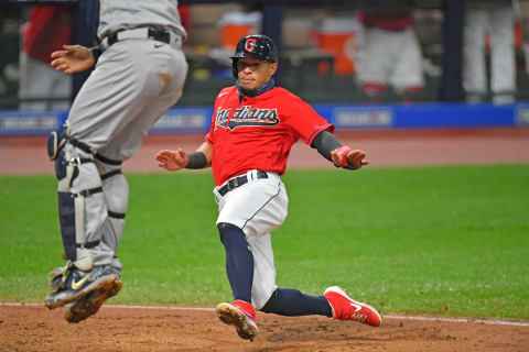 CLEVELAND, OHIO – SEPTEMBER 30: Cesar Hernandez #7 of the Cleveland Indians scores on a double by Jose Ramirez #11 during the fifth inning of Game Two of the American League Wild Card Series against the New York Yankees at Progressive Field on September 30, 2020 in Cleveland, Ohio. (Photo by Jason Miller/Getty Images)