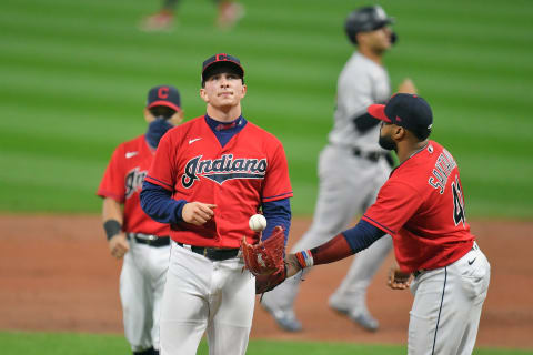 CLEVELAND, OHIO – SEPTEMBER 30: James Karinchak #99 of the Cleveland Indians reacts as he is removed from the game after giving up a grand slam during the fourth inning of Game Two of the American League Wild Card Series against the New York Yankees at Progressive Field on September 30, 2020 in Cleveland, Ohio. (Photo by Jason Miller/Getty Images)