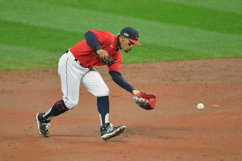 CLEVELAND, OHIO – SEPTEMBER 30: Francisco Lindor #12 of the Cleveland Indians fields a ground ball hit by DJ LeMahieu #26 of the New York Yankees at first during the third inning of Game Two of the American League Wild Card Series at Progressive Field on September 30, 2020 in Cleveland, Ohio. (Photo by Jason Miller/Getty Images)