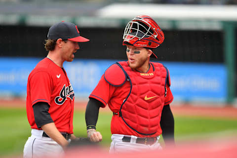 Starting pitcher Shane Bieber #57 talks with catcher Roberto Perez #55 of the Cleveland Indians (Photo by Jason Miller/Getty Images)