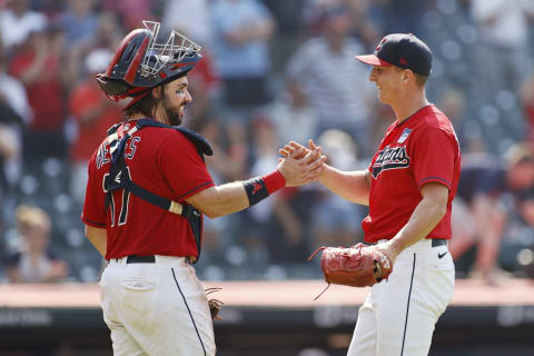 Austin Hedges #17 and James Karinchak #99 of the Cleveland Indians (Photo by Ron Schwane/Getty Images)