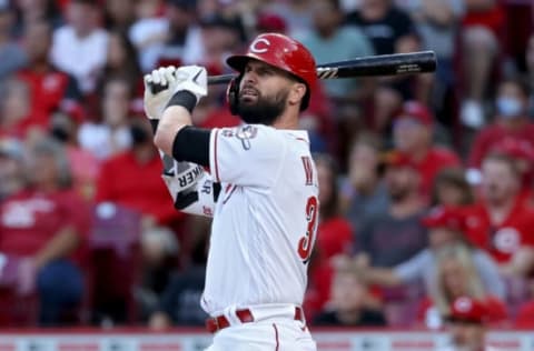 CINCINNATI, OHIO – AUGUST 03: Jesse Winker #33 of the Cincinnati Reds hits a double in the third inning against the Minnesota Twins at Great American Ball Park on August 03, 2021 in Cincinnati, Ohio. (Photo by Dylan Buell/Getty Images)