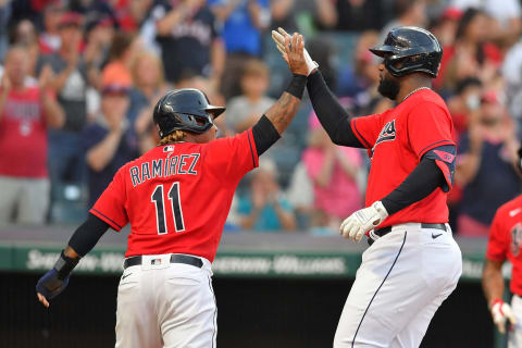 Jose Ramirez #11 celebrates with Franmil Reyes #32 of the Cleveland Indians (Photo by Jason Miller/Getty Images)