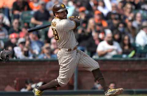 SAN FRANCISCO, CALIFORNIA – SEPTEMBER 16: Tommy Pham #28 of the San Diego Padres hits a two-run RBI double against the San Francisco Giants in the top of the fifth inning at Oracle Park on September 16, 2021 in San Francisco, California. (Photo by Thearon W. Henderson/Getty Images)