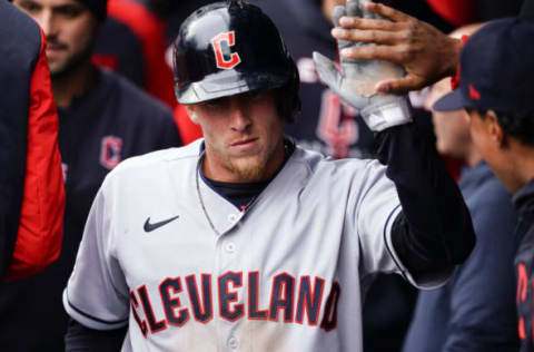 KANSAS CITY, MO – APRIL 07: Myles Straw #7 of the Cleveland Guardians celebrates with teammates after scoring the first run against the Kansas City Royals in the third inning during Opening Day at Kauffman Stadium on April 7, 2022 in Kansas City, Missouri. (Photo by Kyle Rivas/Getty Images)