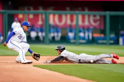 KANSAS CITY, MO – APRIL 07: Myles Straw #7 of the Cleveland Guardians slides safely past the tag from Nicky Lopez #8 of the Kansas City Royals in the third inning during Opening Day at Kauffman Stadium on April 7, 2022 in Kansas City, Missouri. (Photo by Kyle Rivas/Getty Images)