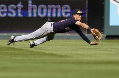 KANSAS CITY, MO – APRIL 09: Steven Kwan #38 of the Cleveland Guardians makes a diving catch in left field against the Kansas City Royals to end the third inning at Kauffman Stadium on April 9, 2022 in Kansas City, Missouri. (Photo by Kyle Rivas/Getty Images)