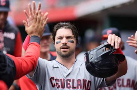 CINCINNATI, OHIO – APRIL 13: Austin Hedges #17 of the Cleveland Guardians celebrates after scoring in the second inning against the Cincinnati Reds at Great American Ball Park on April 13, 2022 in Cincinnati, Ohio. (Photo by Andy Lyons/Getty Images)